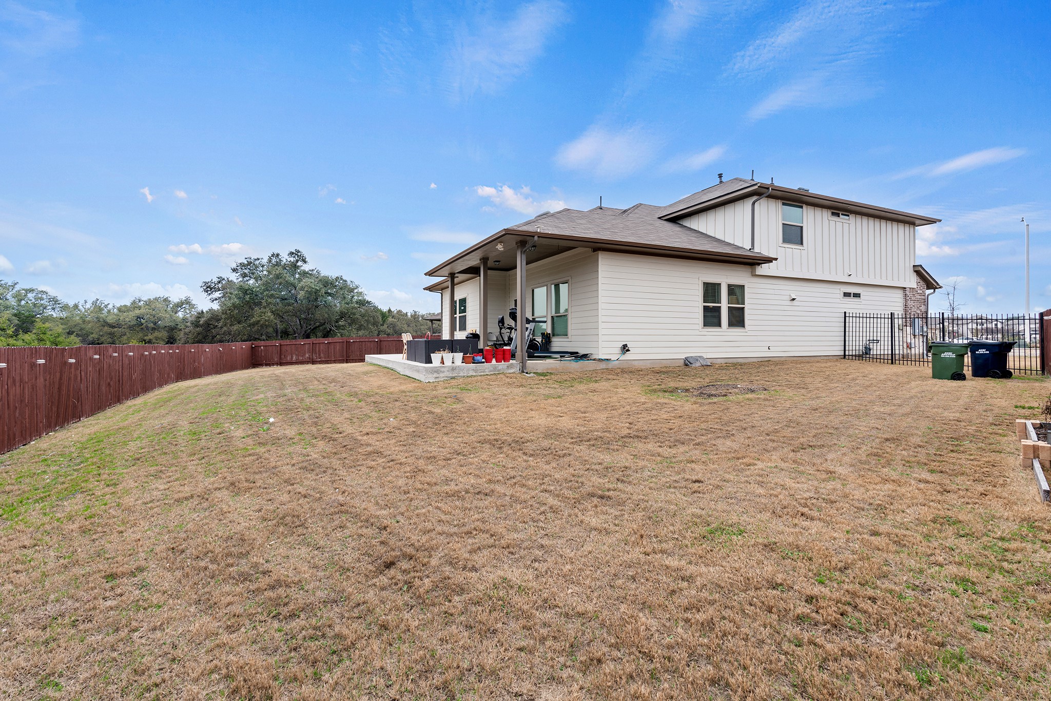 133 Caney Cove Leander, TX 78641 - Photo 29 of 30 Rear view of property featuring a patio area, a fenced backyard, and a yard