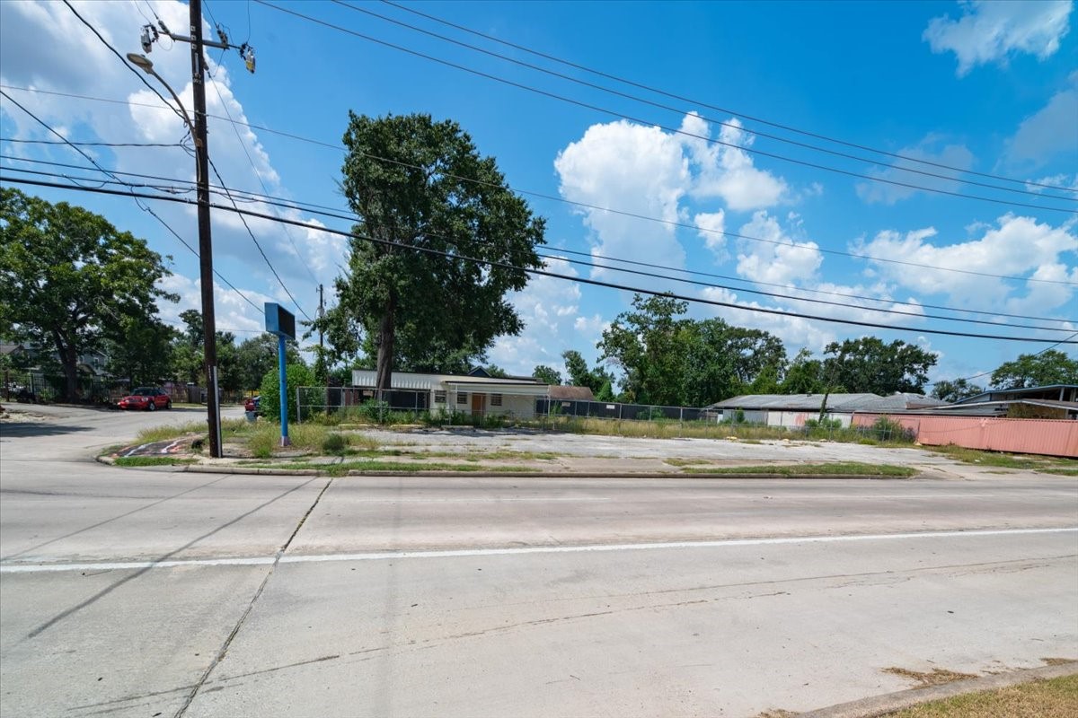 741 McDaniel Street Houston, TX 77022 - Photo 4 of 25 a view of a building along the road and trees