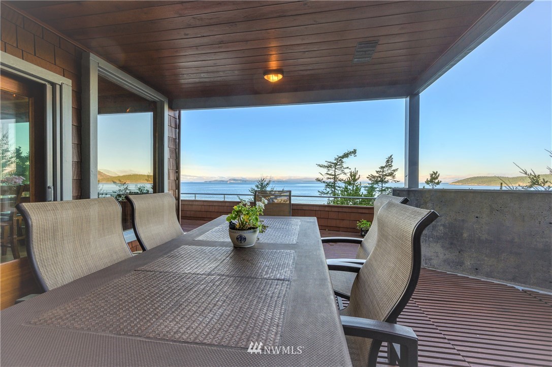 14114 Ervine Road Anacortes, WA 98221 - Photo 20 of 40 a view of a dining room with furniture