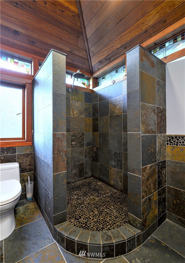 14114 Ervine Road Anacortes, WA 98221 - Photo 26 of 40 a bathroom with a toilet and a shower