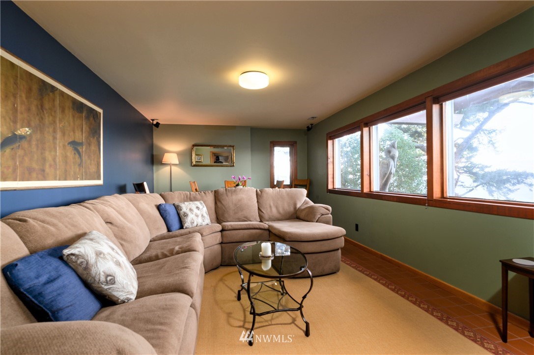 14114 Ervine Road Anacortes, WA 98221 - Photo 29 of 40 a living room with furniture and a large window