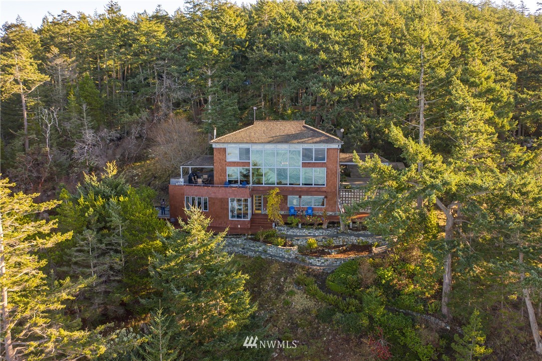14114 Ervine Road Anacortes, WA 98221 - Photo 39 of 40 a view of a house with a yard and sitting area