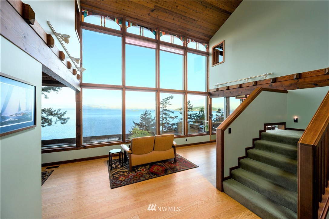 14114 Ervine Road Anacortes, WA 98221 - Photo 10 of 40 a living room with furniture and a large window
