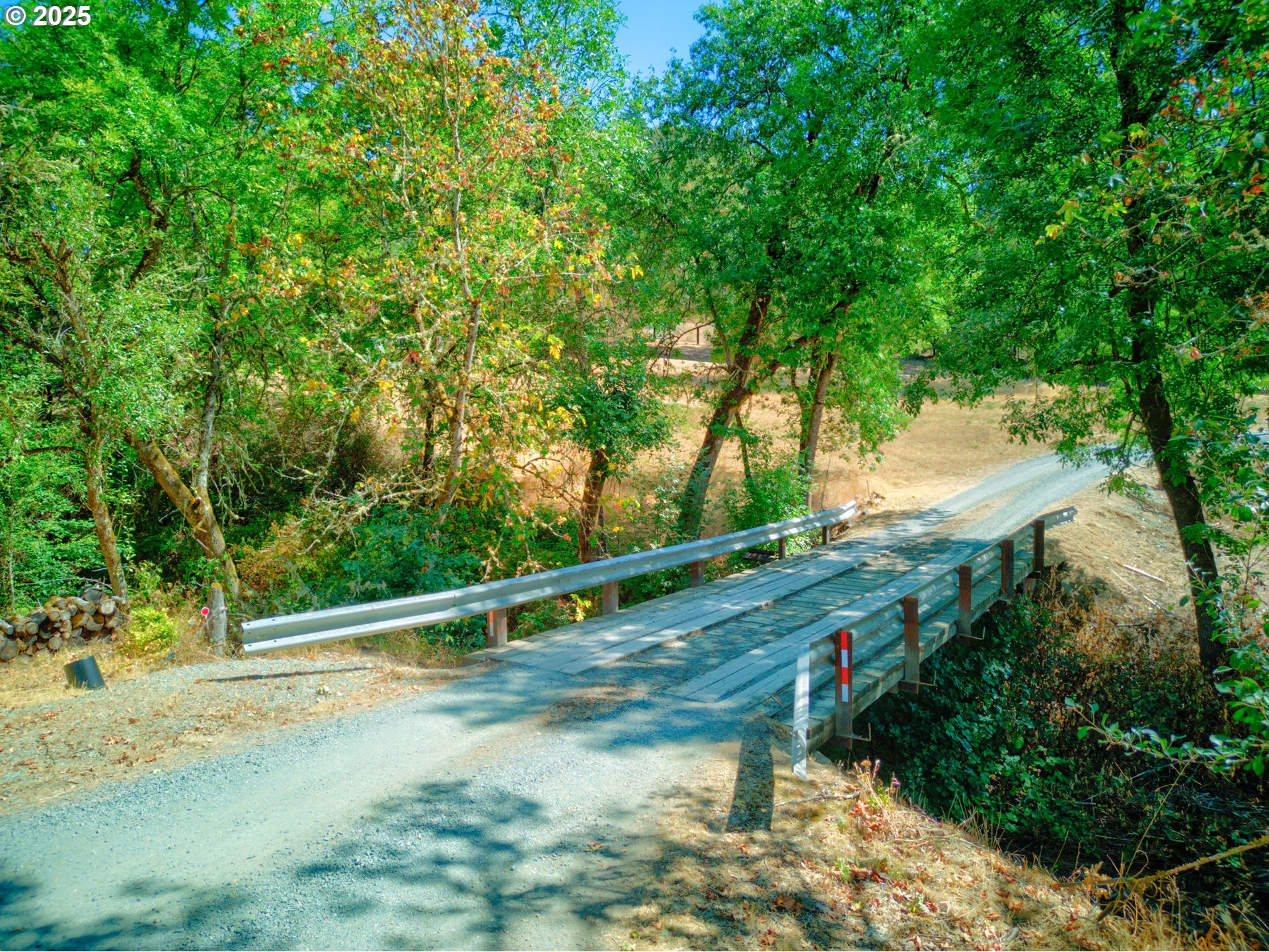 187 Hackett Lane Riddle, OR 97469 - Photo 37 of 48 a view of a yard with large trees