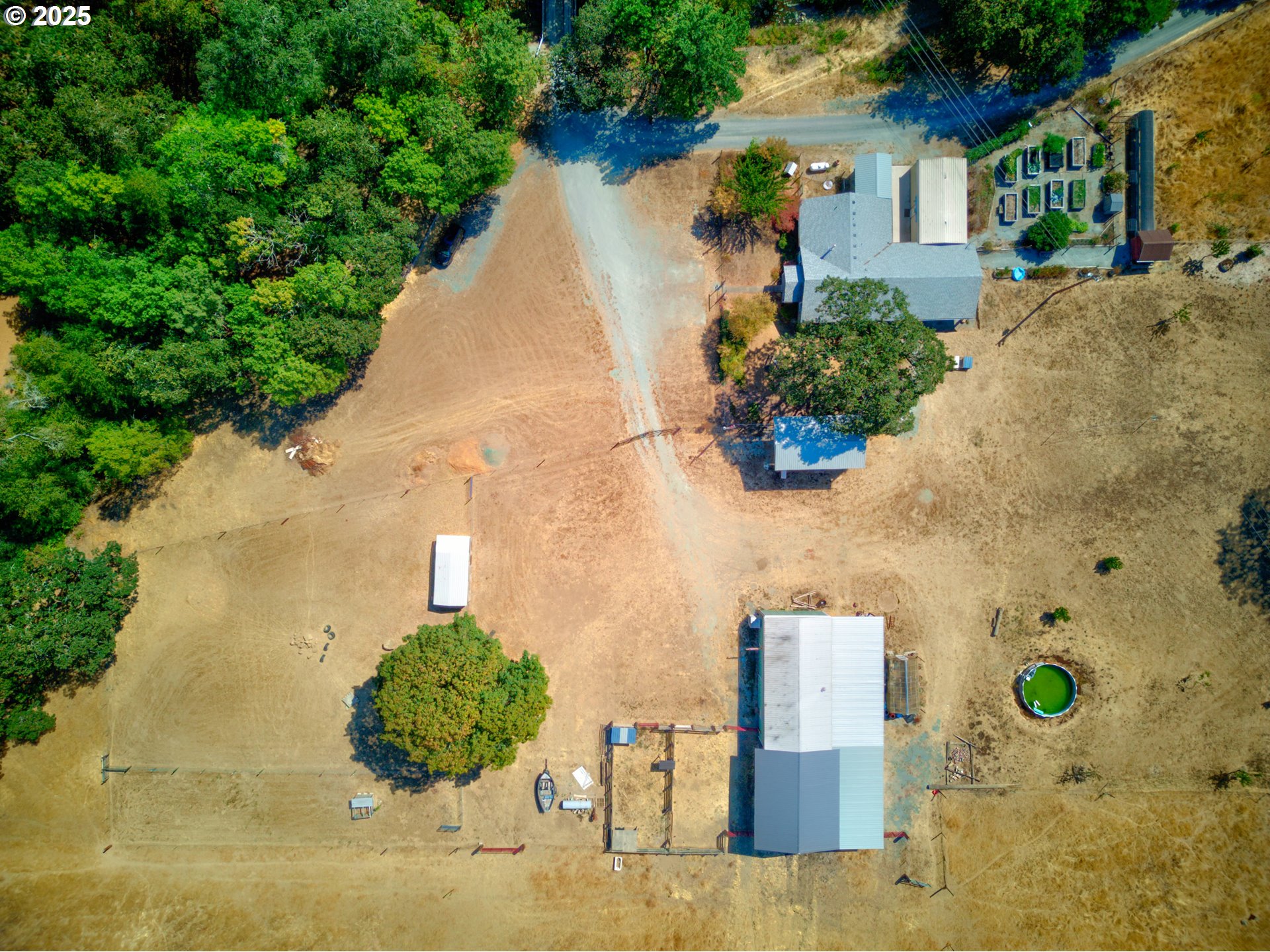 187 Hackett Lane Riddle, OR 97469 - Photo 40 of 48 an aerial view of a house with outdoor space