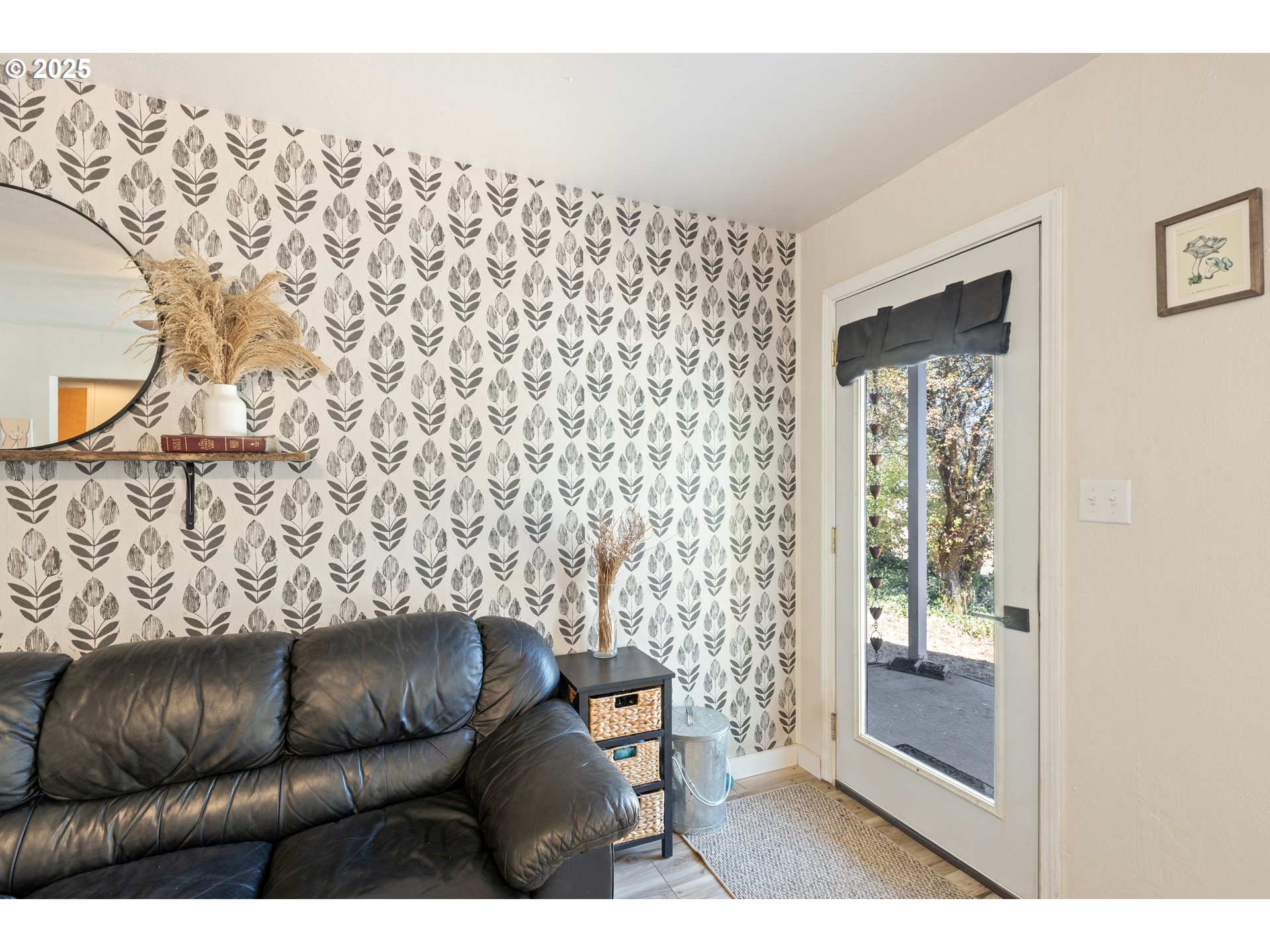 187 Hackett Lane Riddle, OR 97469 - Photo 5 of 48 a living room with a couch and a table