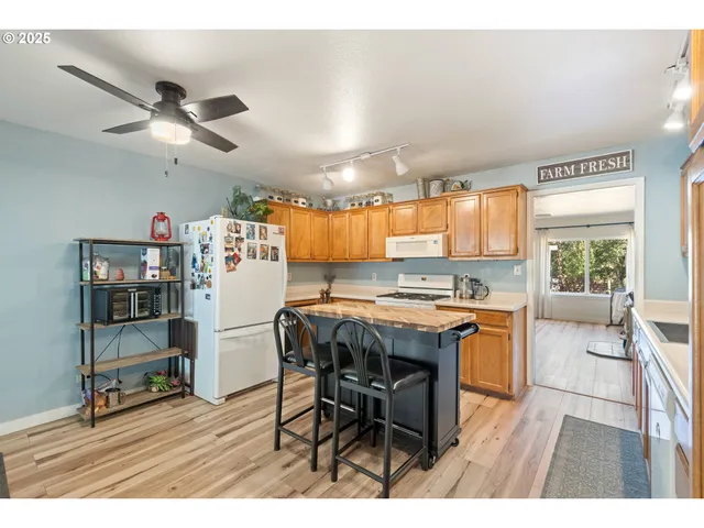 a view of a kitchen and dining room