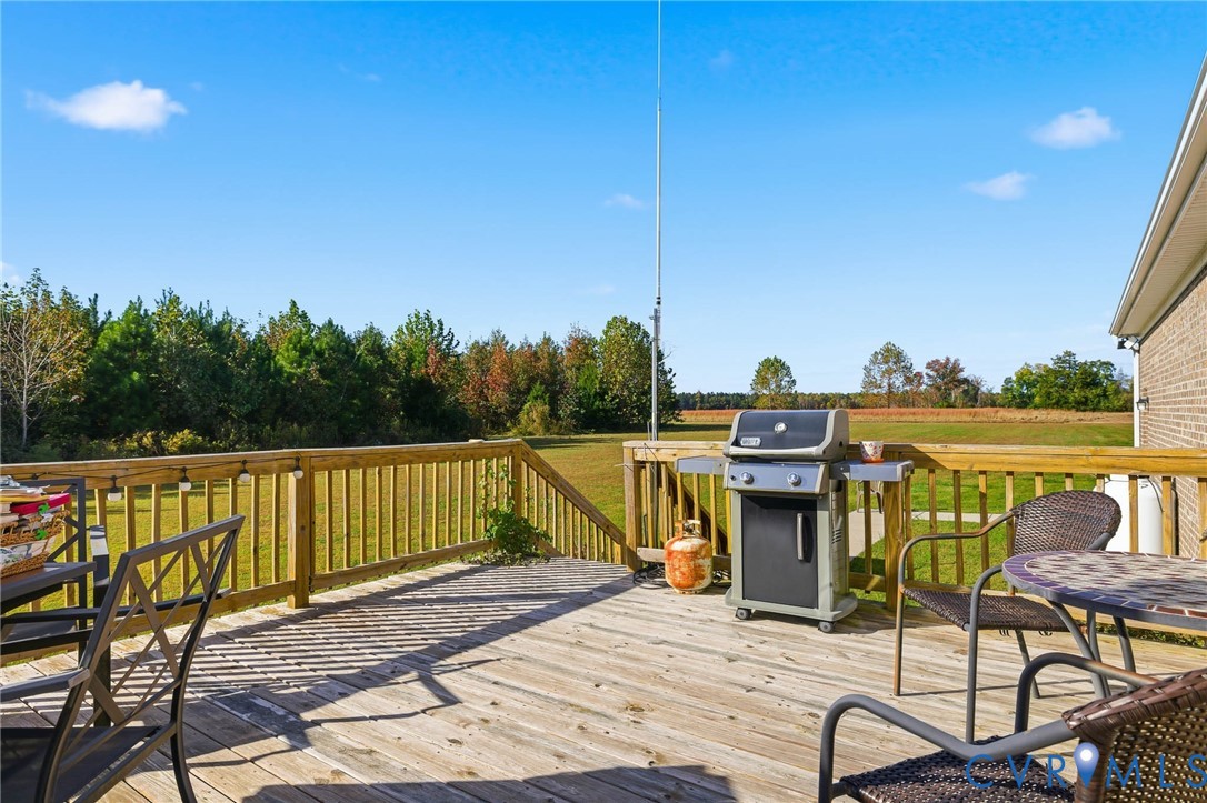 15900 Nobles Road Disputanta, VA 23842 - Photo 23 of 36 Deck featuring area for grilling and a wide open v