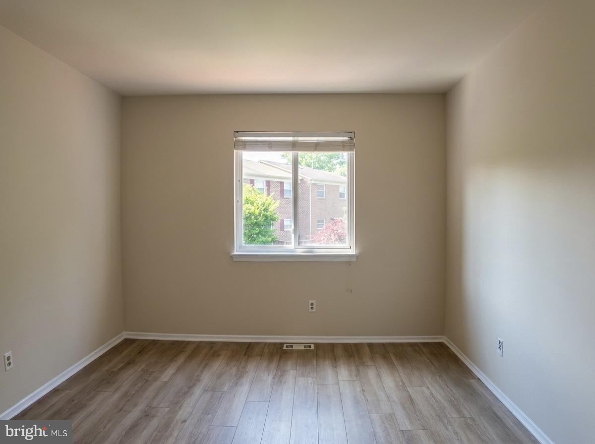 3614 Fawn Spring Court Baltimore, MD 21234 - Photo 15 of 22 an empty room with a window