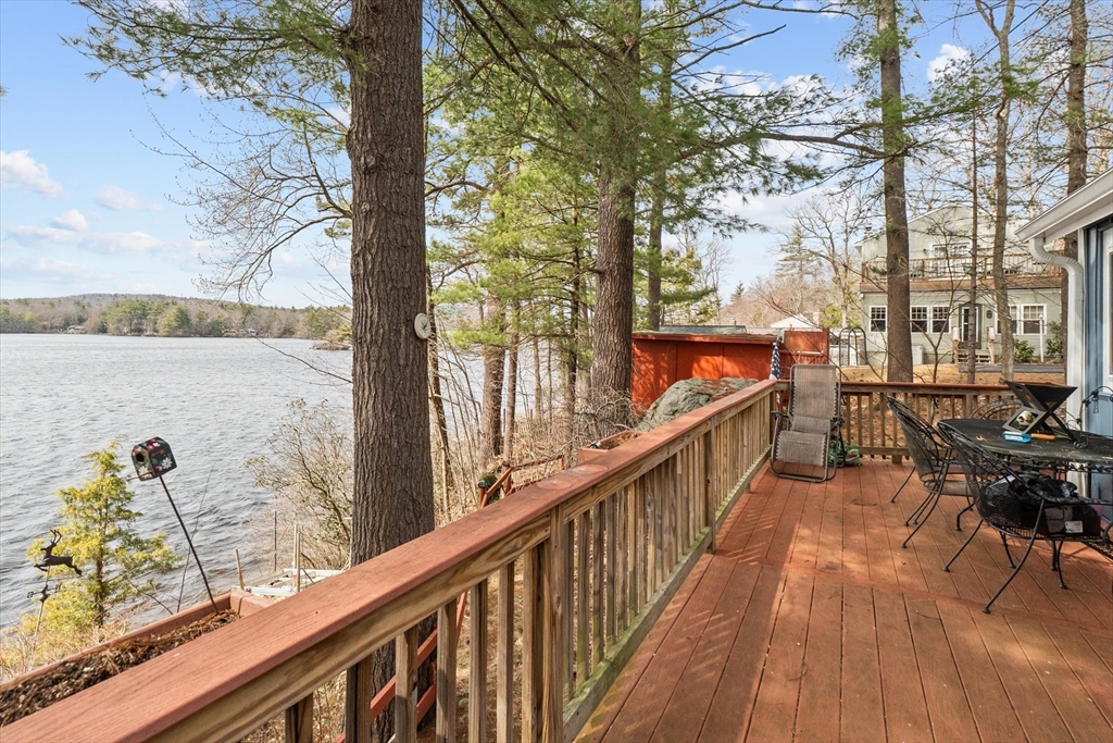 110 Stodge Meadow Road Ashburnham, MA 01430 - Photo 18 of 27 a balcony with wooden floor and outdoor seating