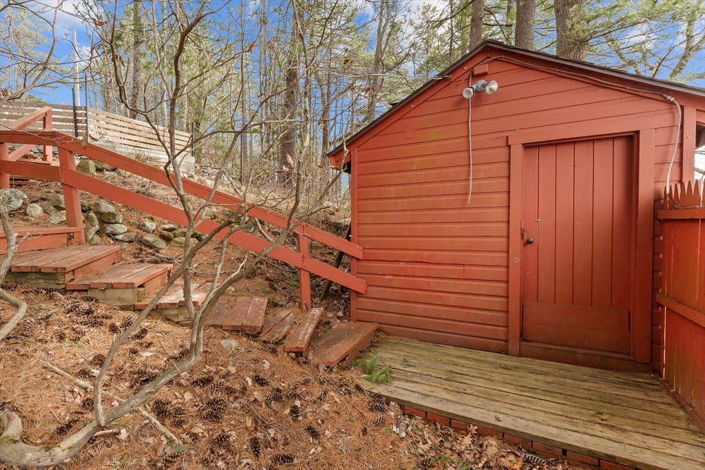 110 Stodge Meadow Road Ashburnham, MA 01430 - Photo 21 of 27 a view of wooden house with a small yard