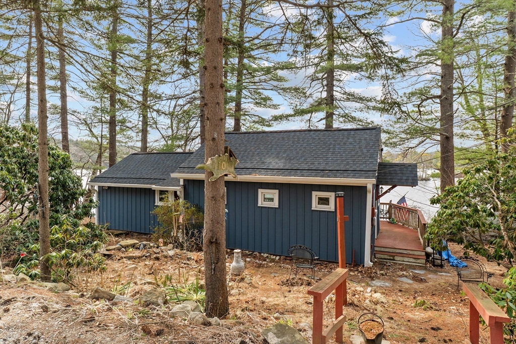 110 Stodge Meadow Road Ashburnham, MA 01430 - Photo 3 of 27 a front view of a house with a yard