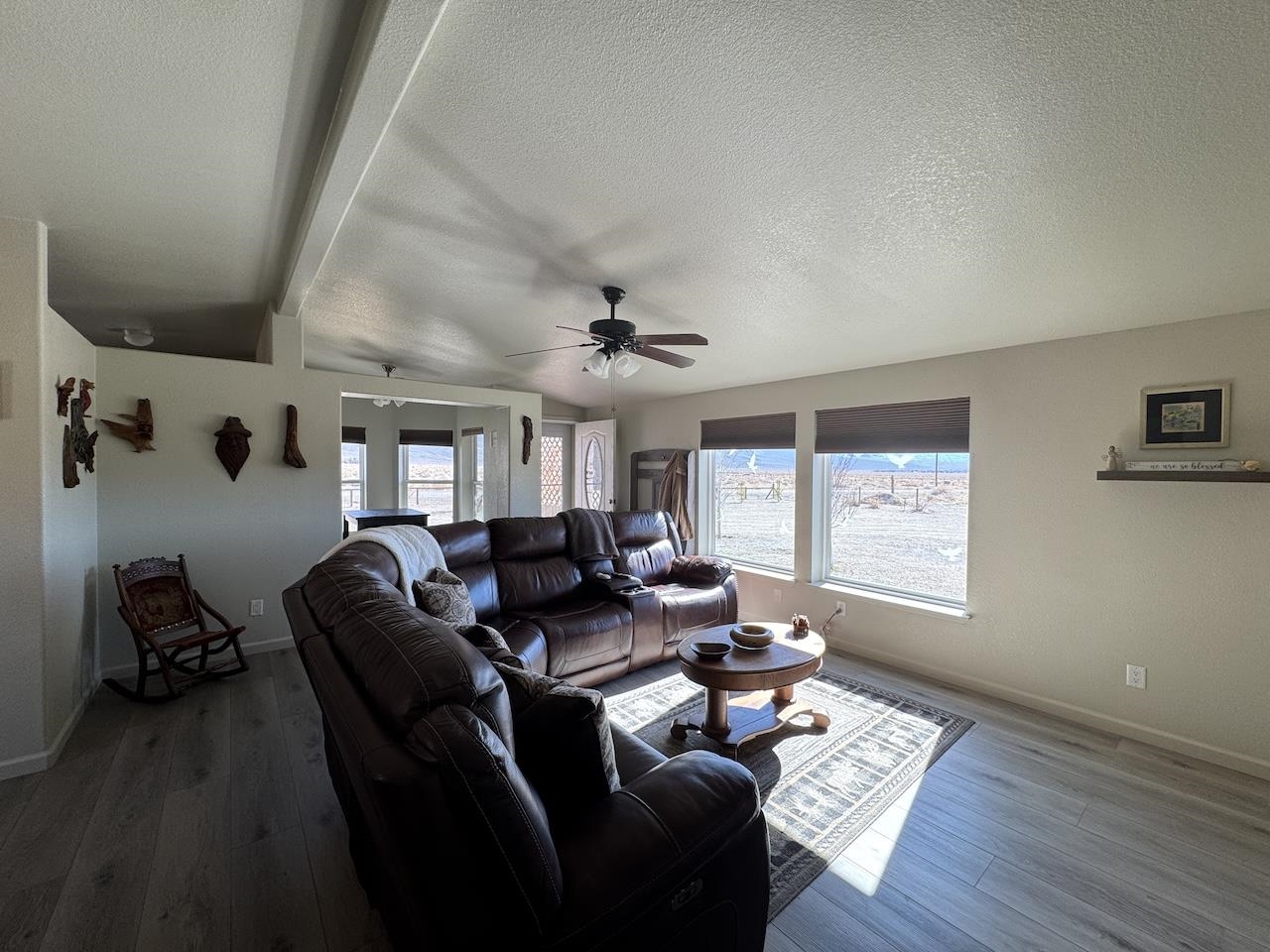 352 Wofford Road, Unit 4 Bishop, CA 93514 - Photo 11 of 40 Living room with dark wood-style flooring, ceiling fan, and beamed ceiling