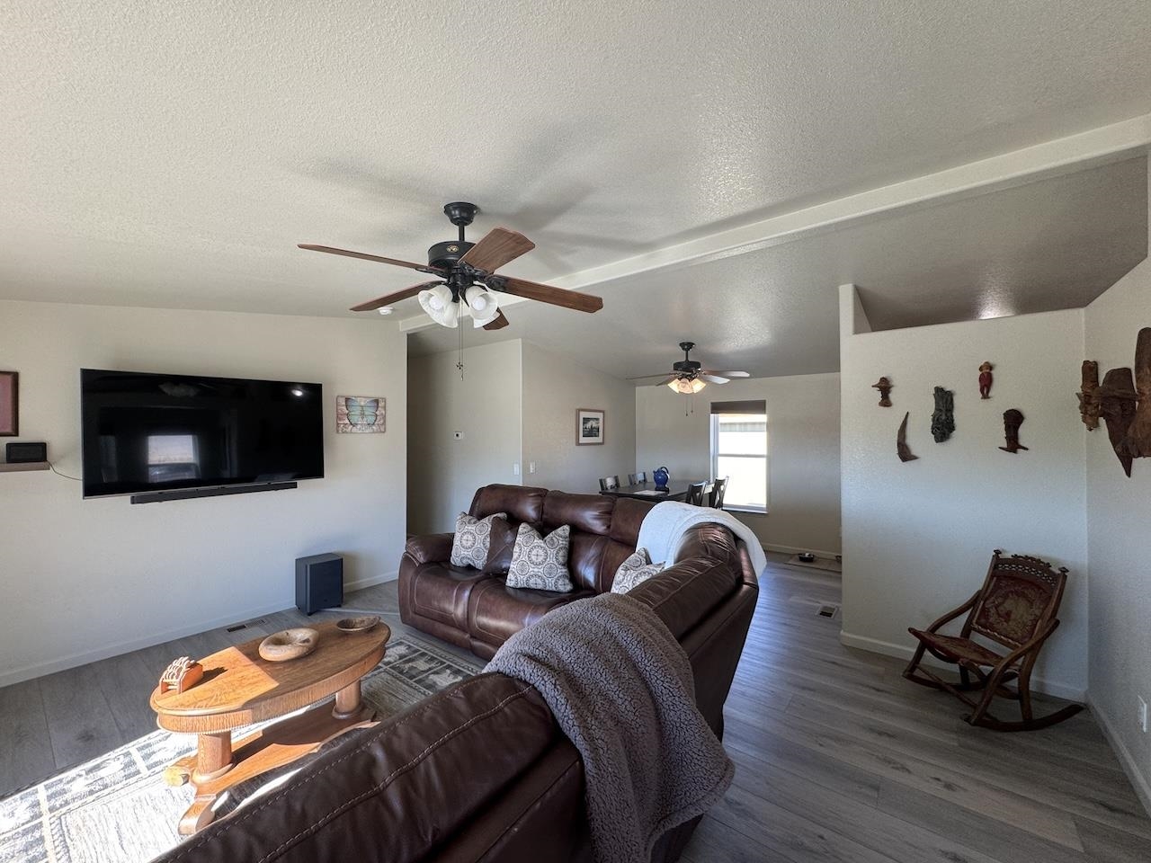 352 Wofford Road, Unit 4 Bishop, CA 93514 - Photo 12 of 40 Living room featuring wood finished floors and ceiling fan
