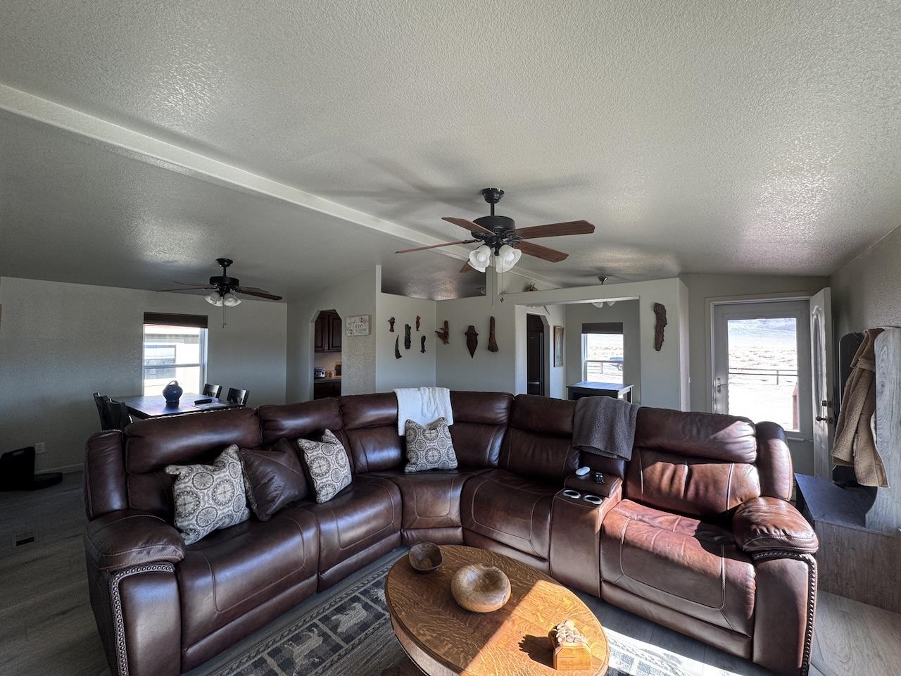 352 Wofford Road, Unit 4 Bishop, CA 93514 - Photo 13 of 40 Living room with wood finished floors and a ceiling fan