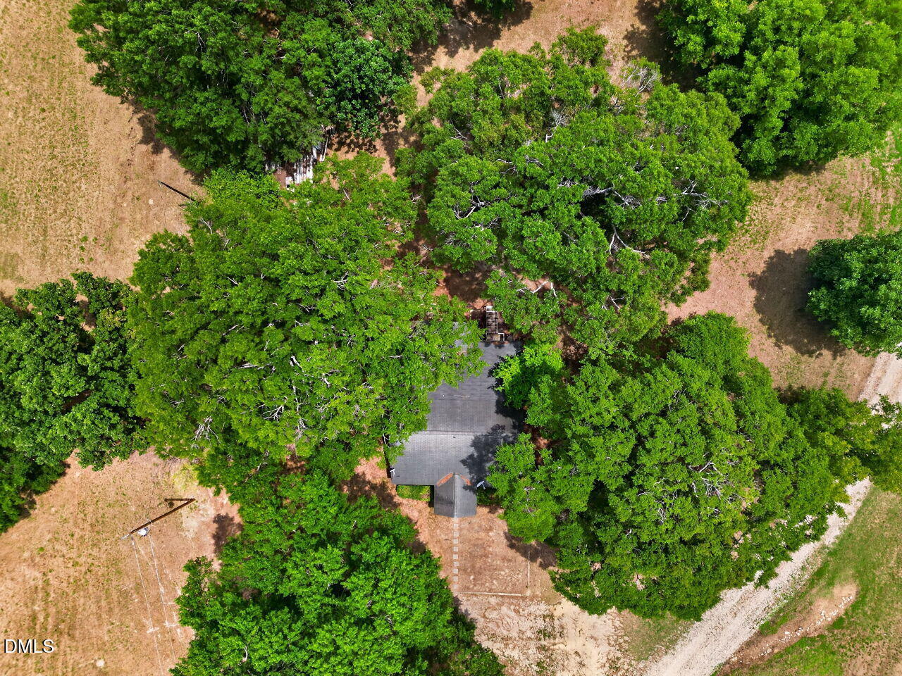 1217 Eagle Rock Road Wendell, NC 27591 - Photo 6 of 17 an aerial view of residential house with outdoor space and trees all around