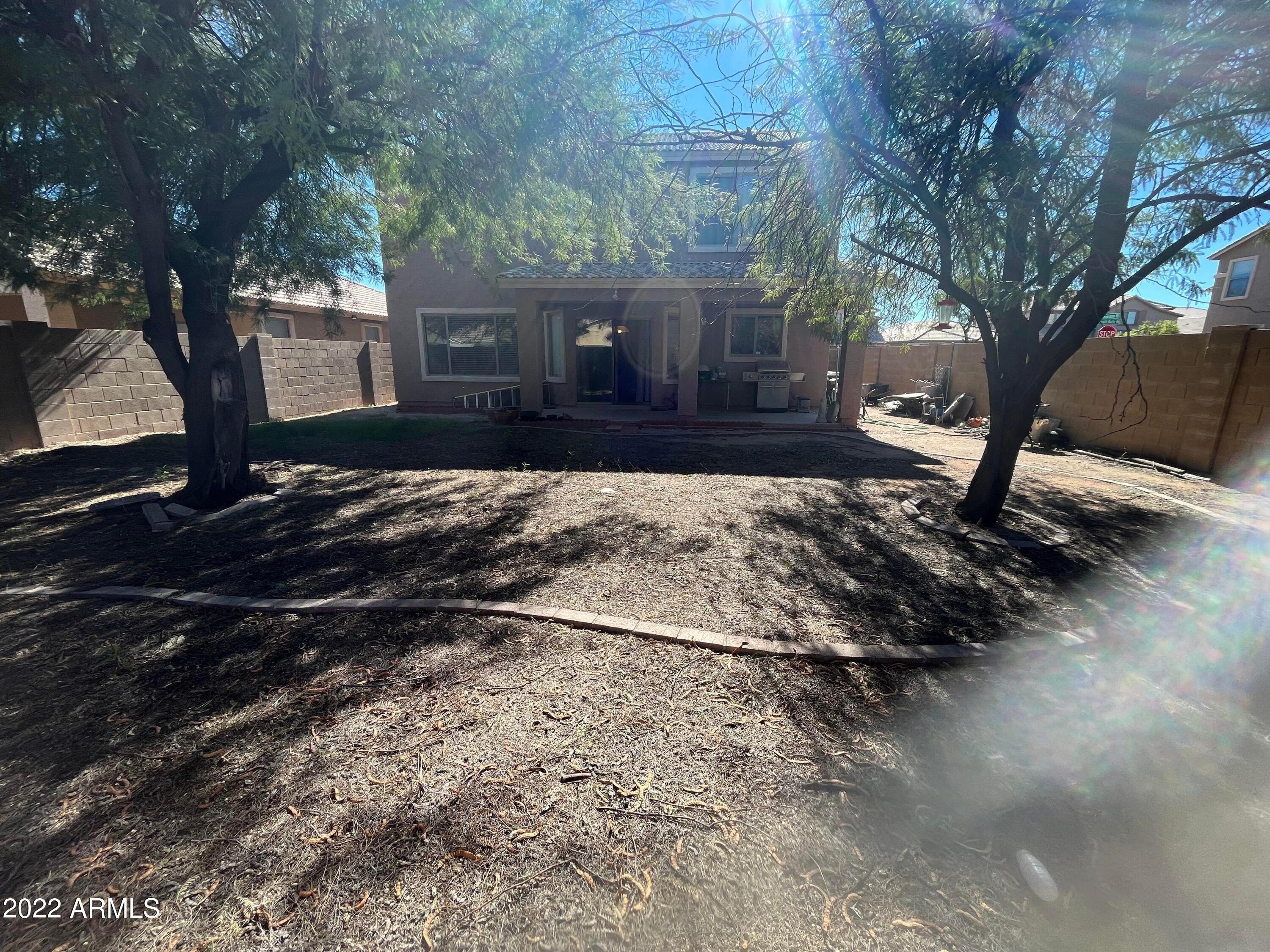 3790 West South Butte Road Queen Creek, AZ 85144 - Photo 39 of 40 a view of a house with a yard