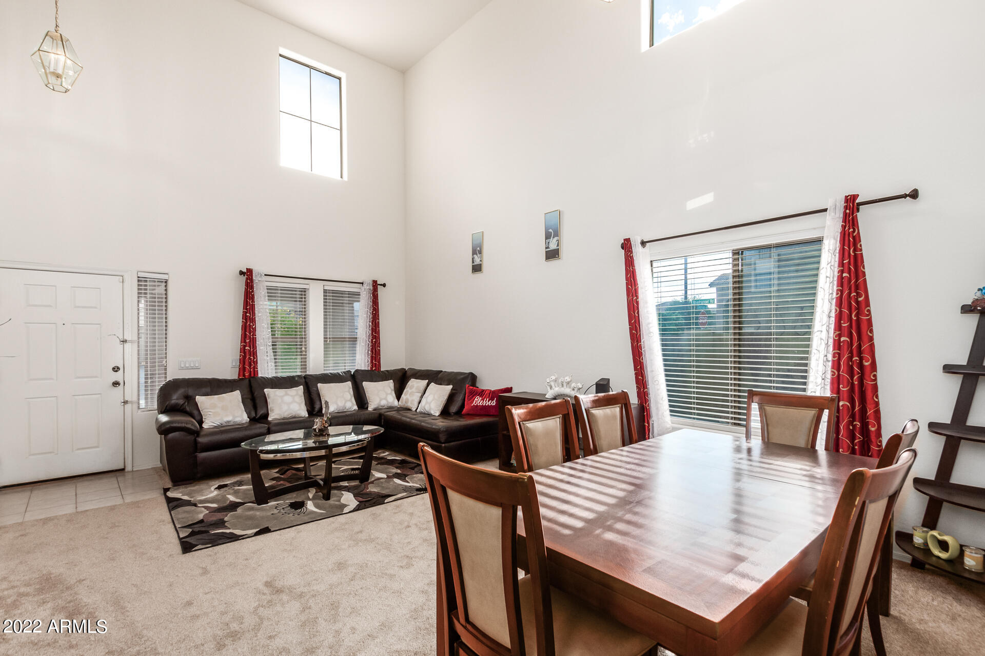 3790 West South Butte Road Queen Creek, AZ 85144 - Photo 4 of 40 a living room with furniture and a wooden floor