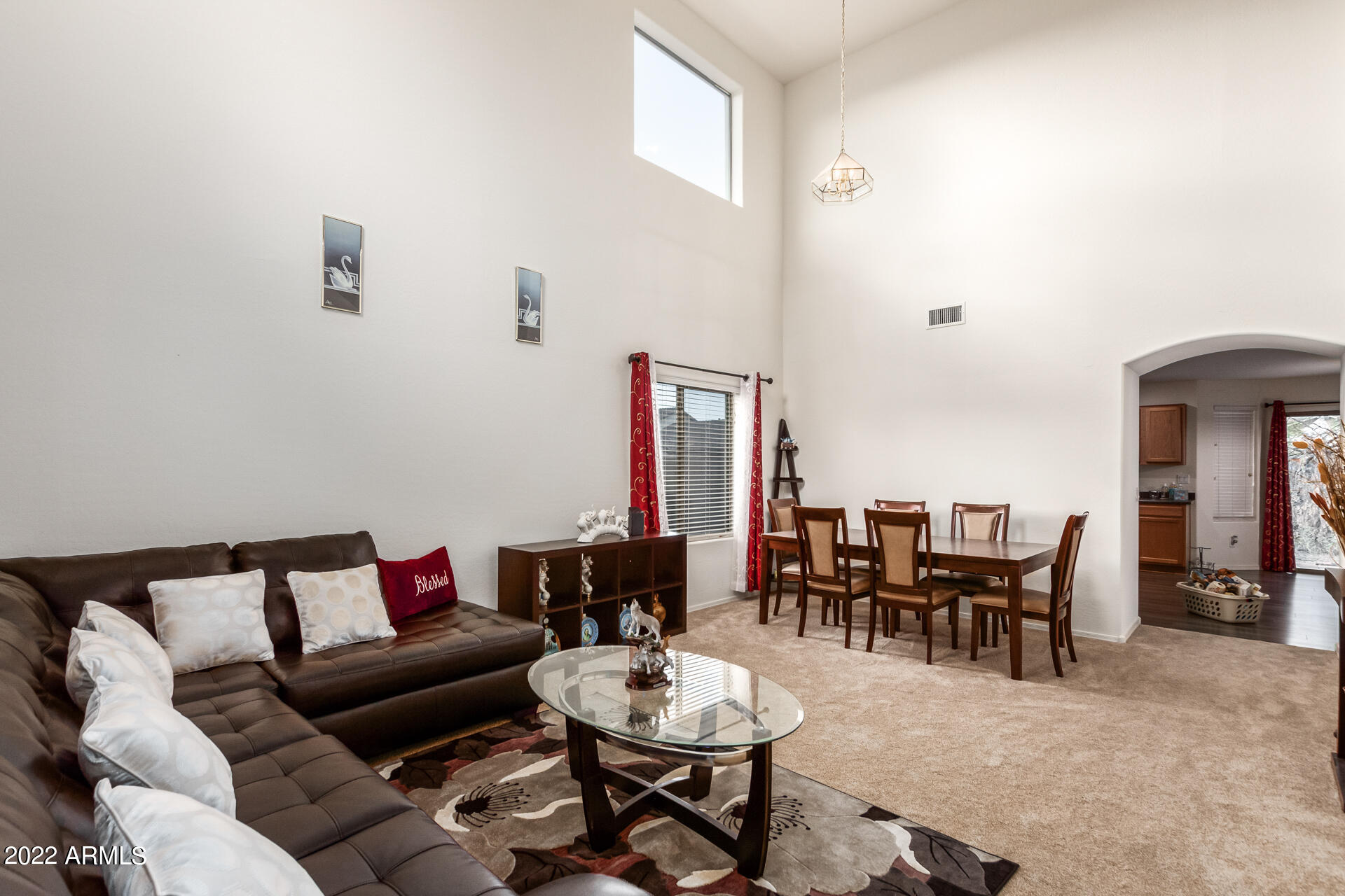 3790 West South Butte Road Queen Creek, AZ 85144 - Photo 5 of 40 a living room with furniture and wooden floor