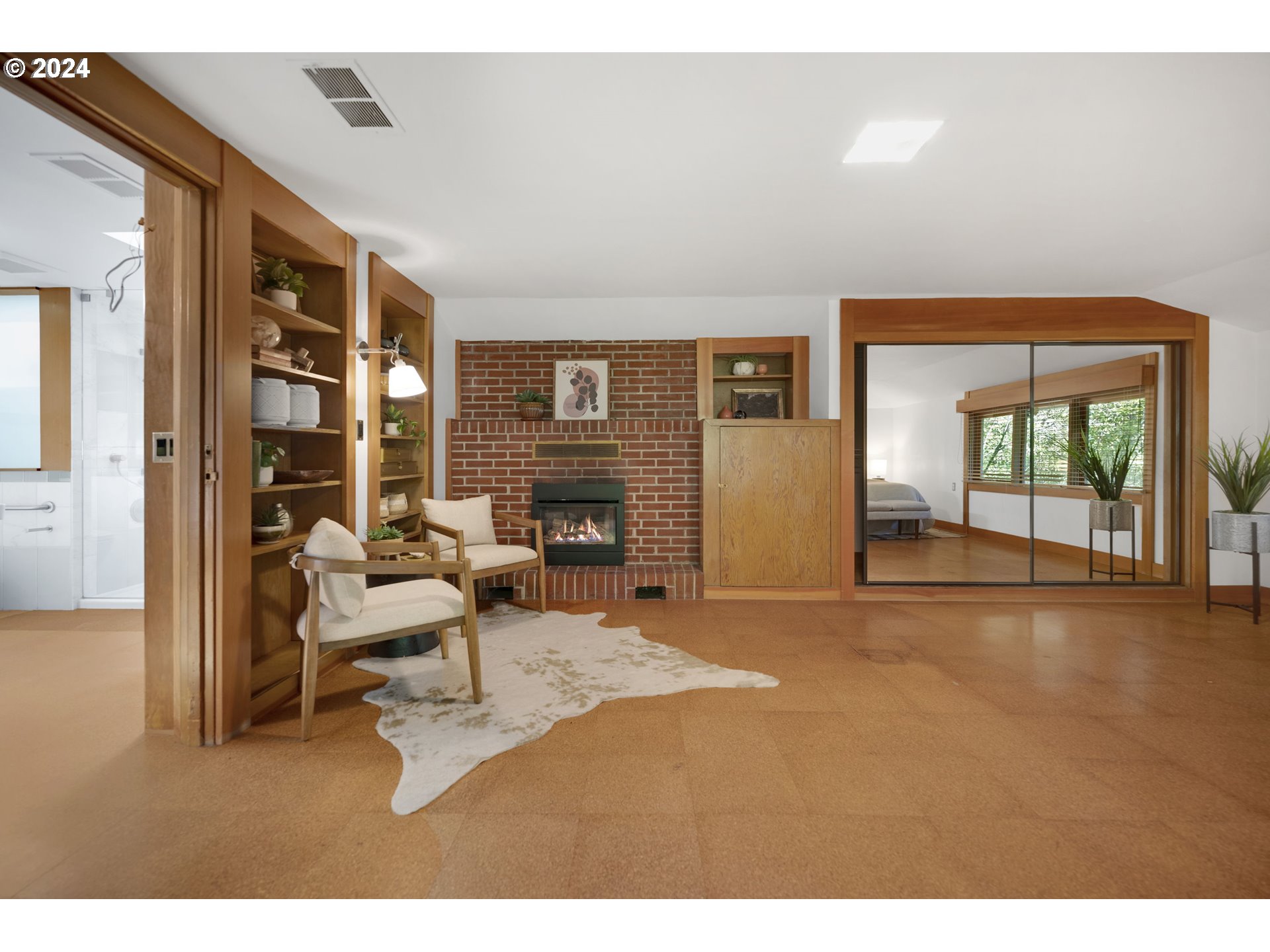 3901 Southwest Hamilton Street Portland, OR 97221 - Photo 16 of 38 a living room with furniture large window and a fireplace