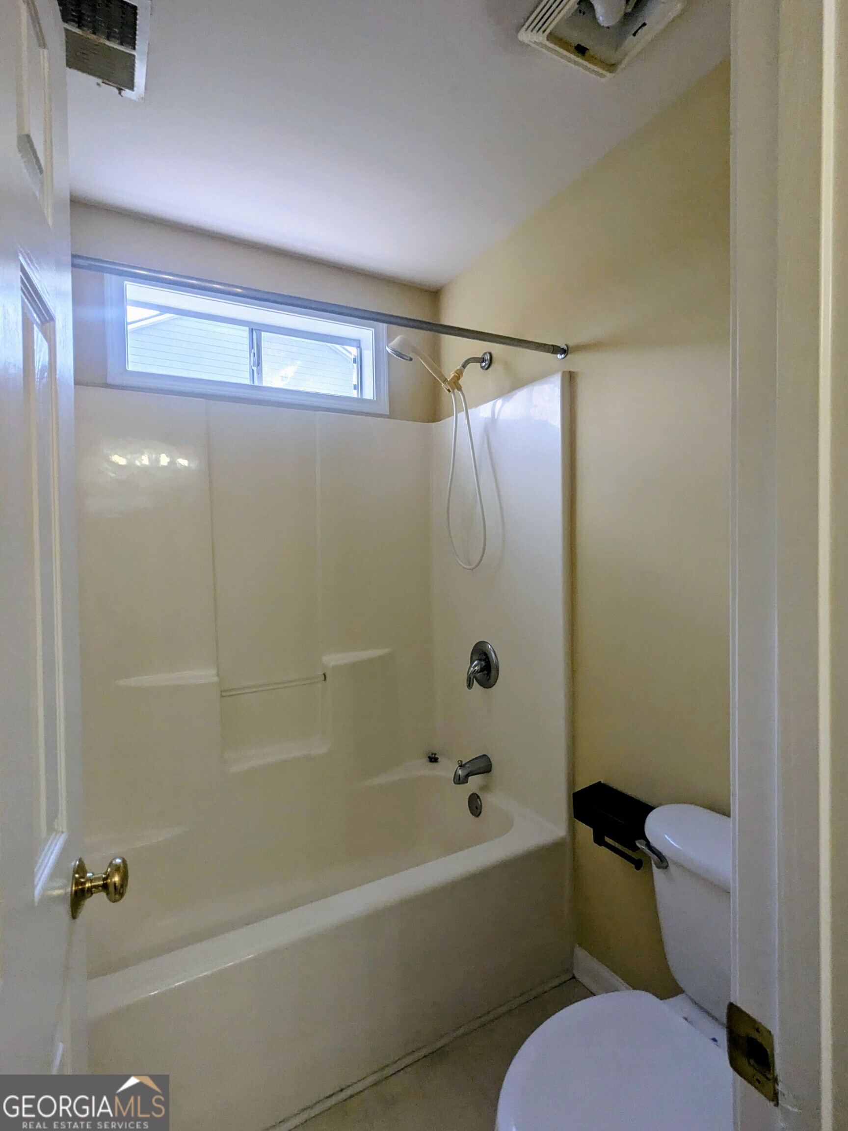 137 Village Green Circle Tyrone, GA 30290 - Photo 18 of 30 a bathroom with a sink and a mirror