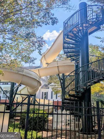 a view of a balcony with chairs