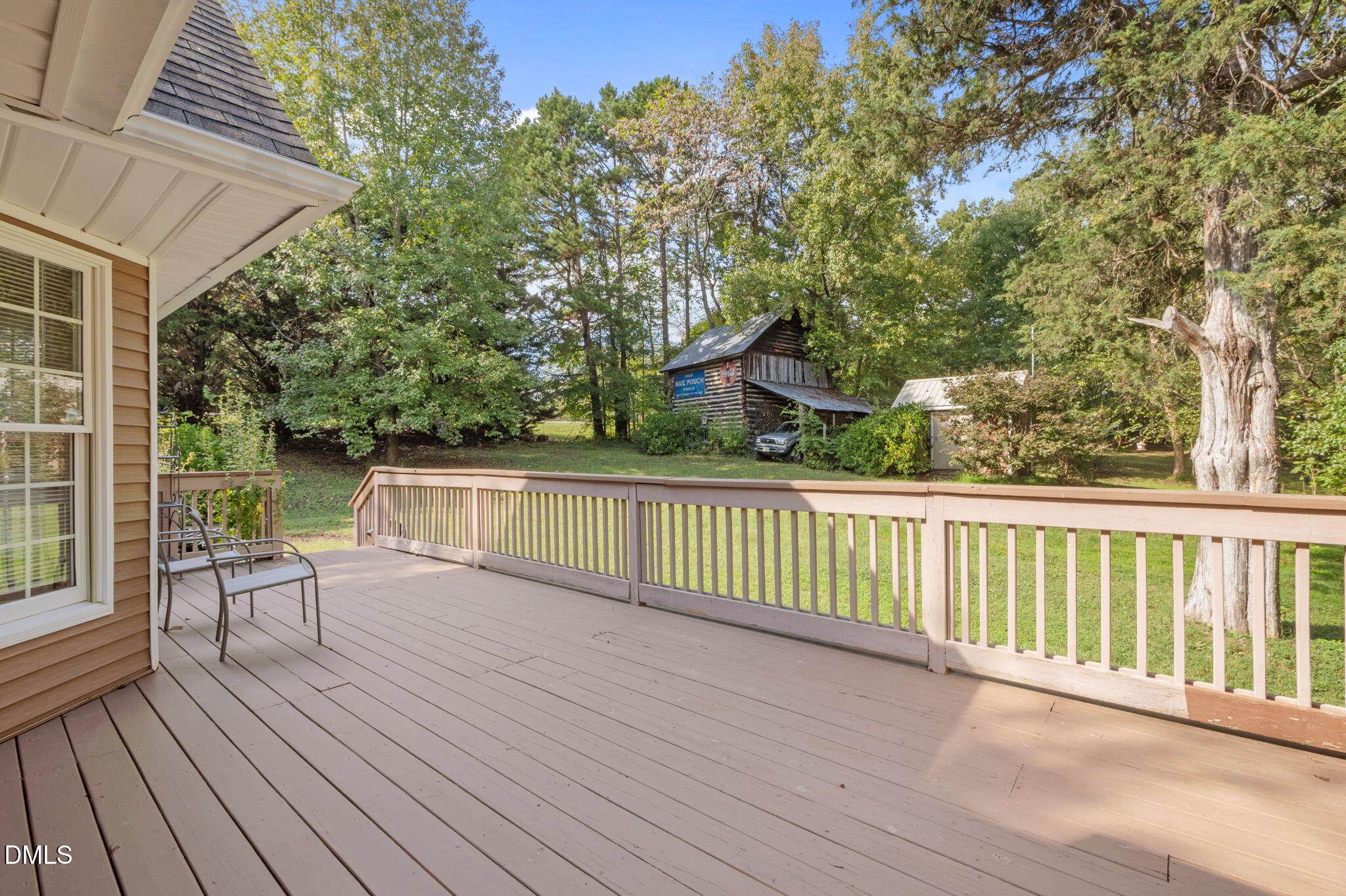 25 Poplar Lane Roxboro, NC 27574 - Photo 13 of 41 a view of balcony with wooden floor and seating space