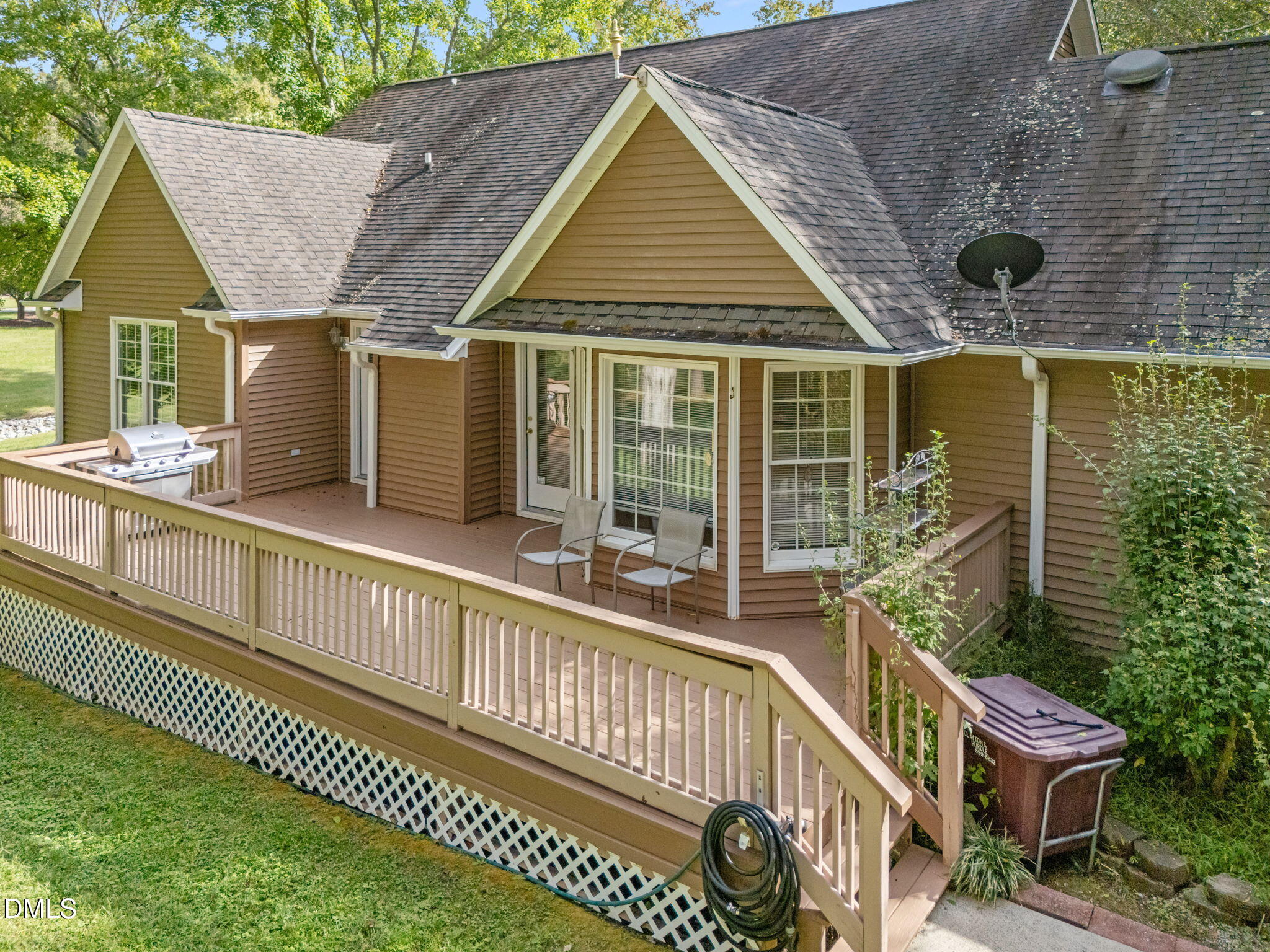 25 Poplar Lane Roxboro, NC 27574 - Photo 7 of 41 a view of a house with a wooden deck