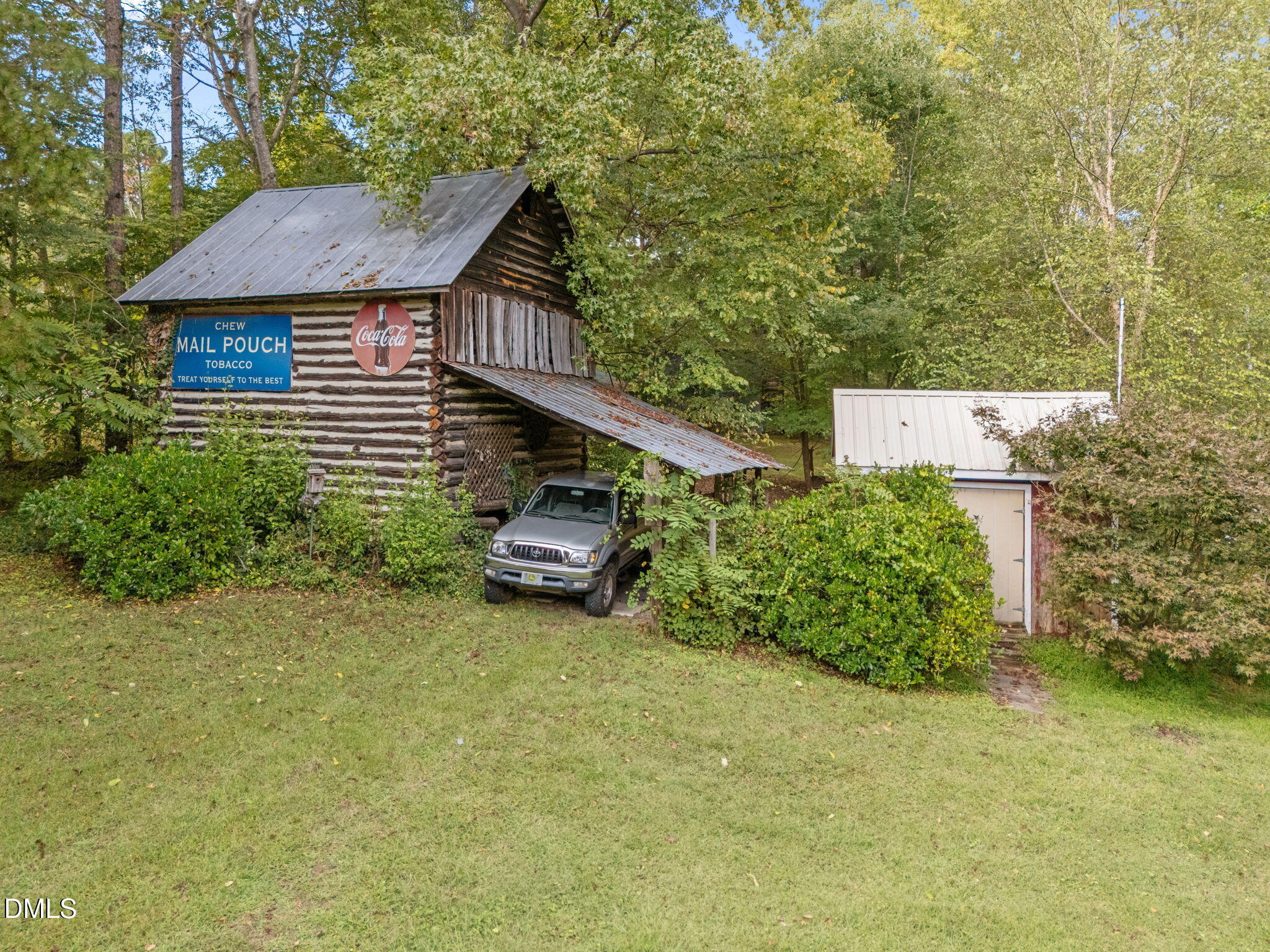 25 Poplar Lane Roxboro, NC 27574 - Photo 9 of 41 a house with trees in front of it