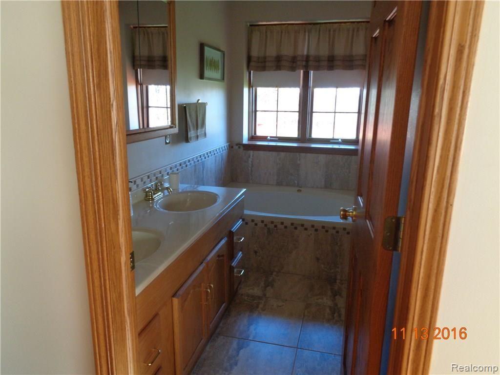 4460 Capac Road Capac, MI 48014 - Photo 8 of 26 Capac Road master bath.JPG