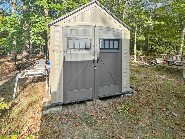 a dinning table and chairs in a patio