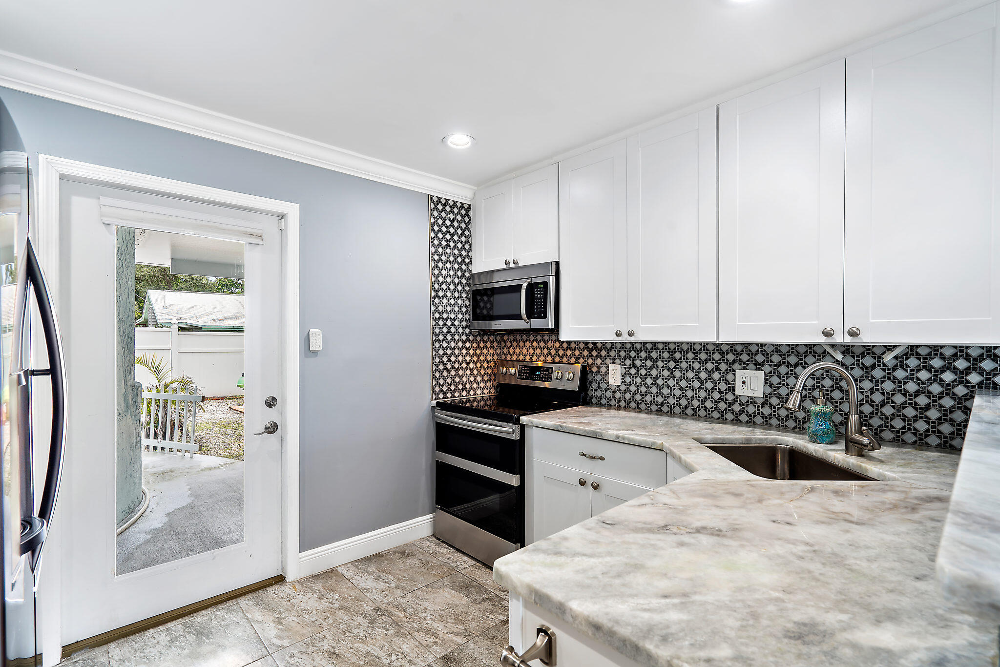 1779 Len Drive North Palm Beach, FL 33408 - Photo 10 of 32 1779 Len Dr 2 bedroom kitchen 2