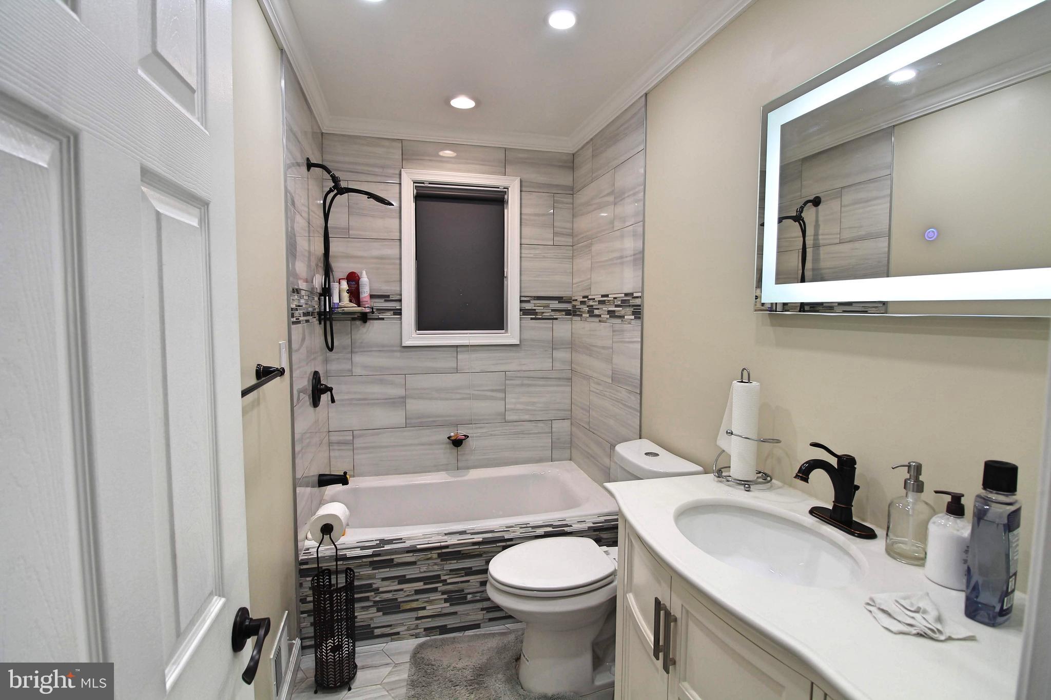 6915 Chambers Road Baltimore, MD 21234 - Photo 23 of 36 Remodeled Bathroom!