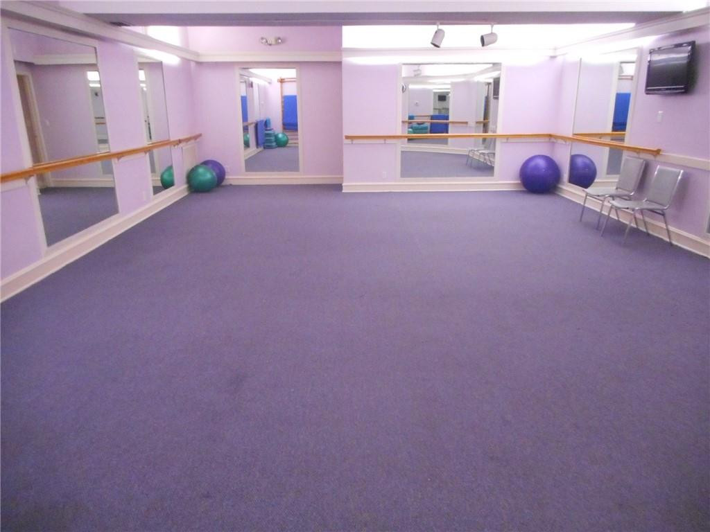 3760 Inverrary Drive, Unit N 1Y Lauderhill, FL 33319 - Photo 17 of 28 a lobby with furniture and a large window