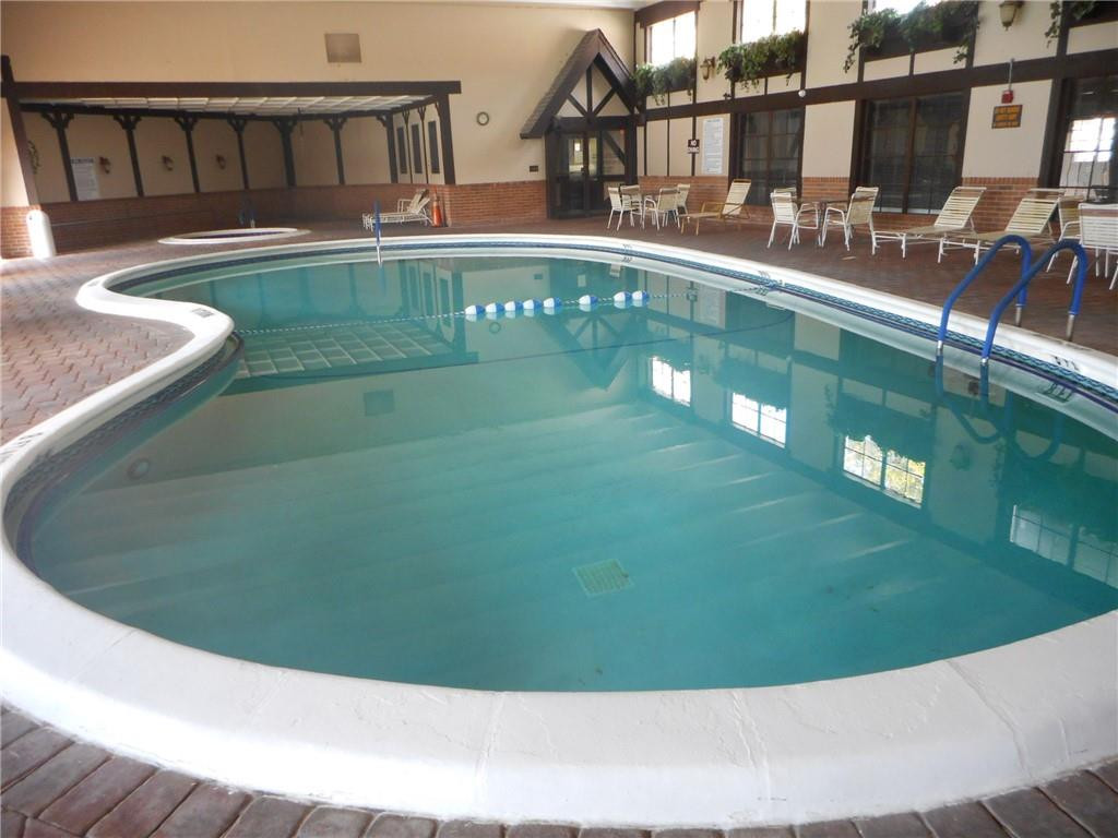3760 Inverrary Drive, Unit N 1Y Lauderhill, FL 33319 - Photo 19 of 28 a view of swimming pool with a yard and sitting area