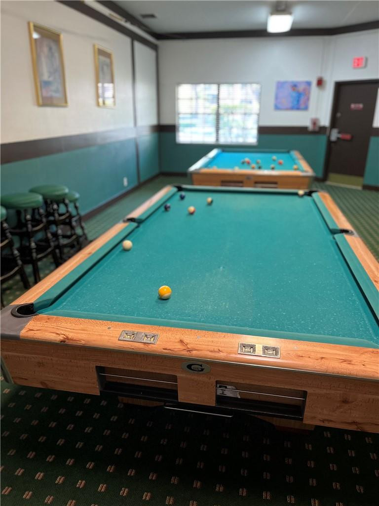 3760 Inverrary Drive, Unit N 1Y Lauderhill, FL 33319 - Photo 25 of 28 a room with pool table and windows