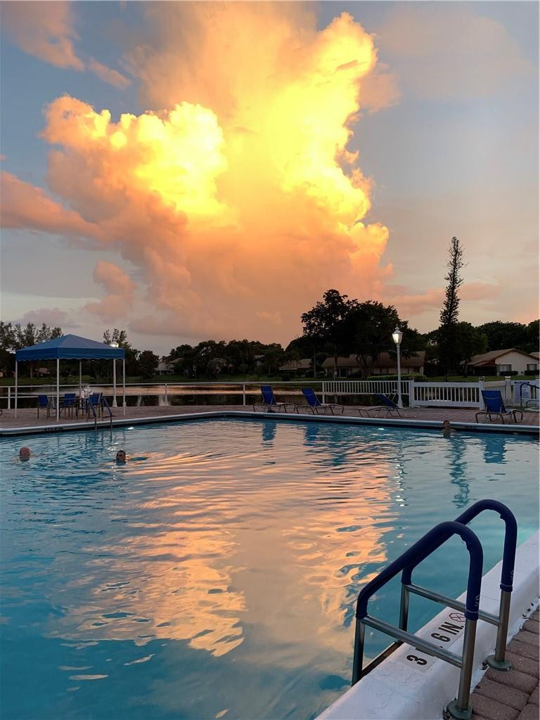 3760 Inverrary Drive, Unit N 1Y Lauderhill, FL 33319 - Photo 27 of 28 a view of a lake from a balcony