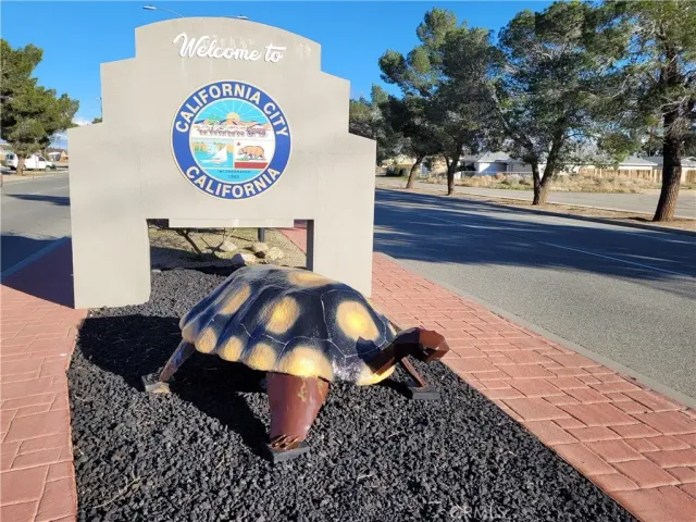 a picture of a table and chairs in wooden floor