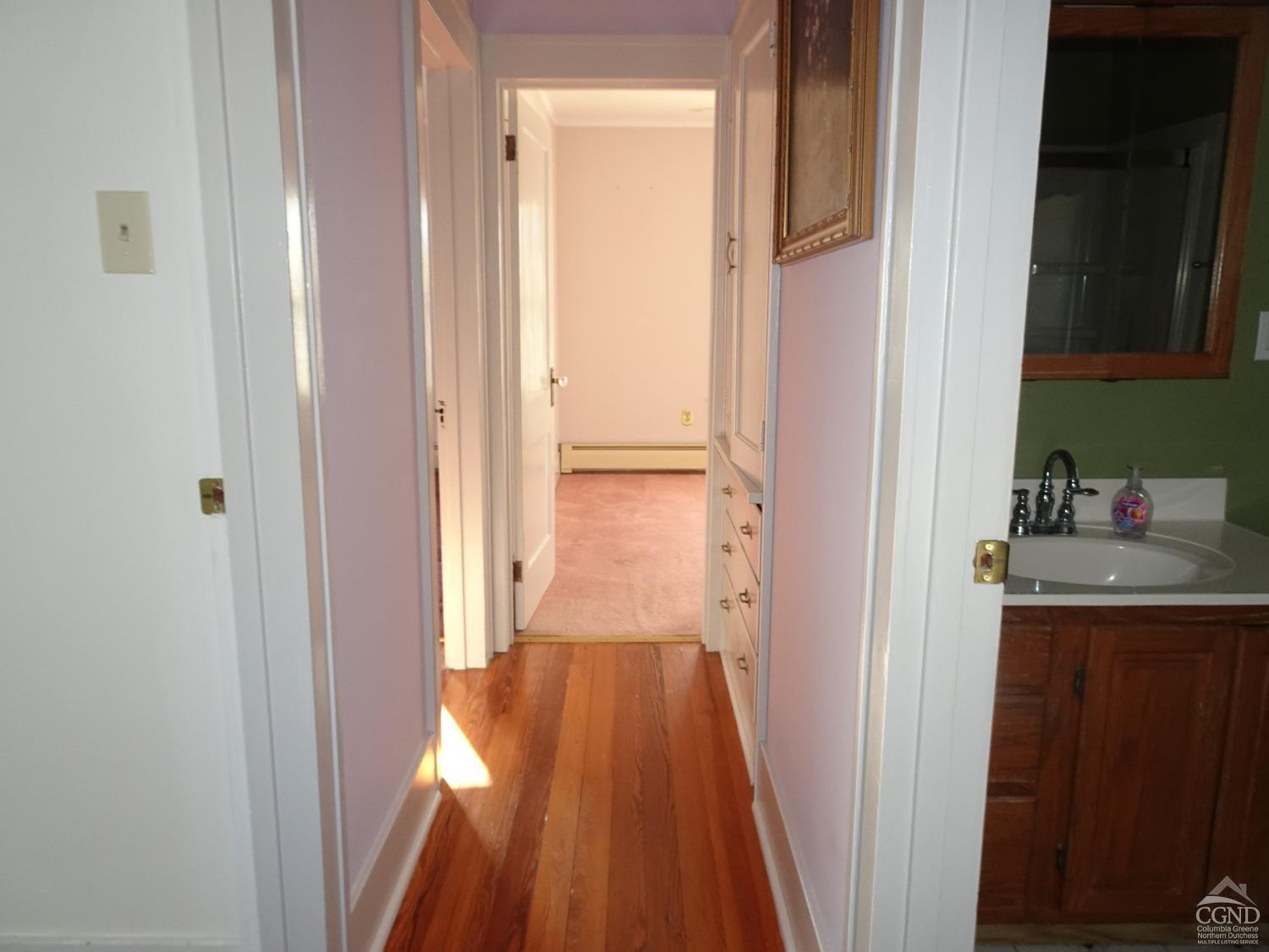 161 Highway 23 Claverack, NY 12513 - Photo 19 of 56 a view of a hallway with wooden floor and a bathroom