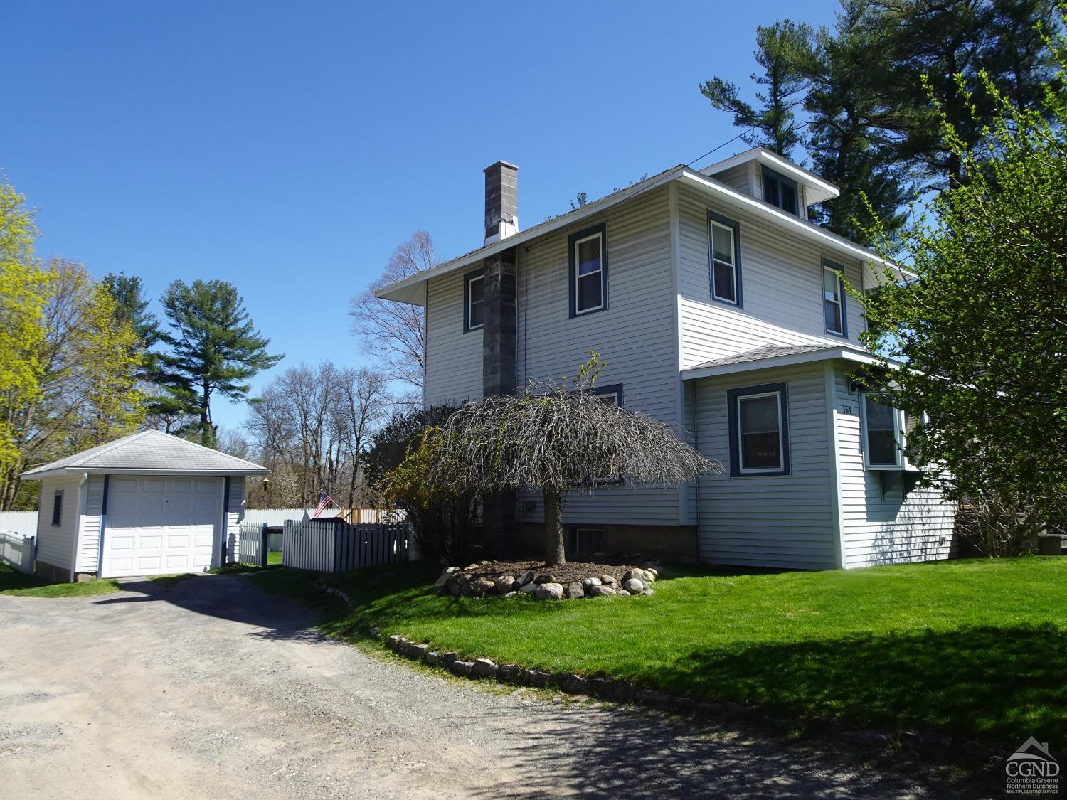 161 Highway 23 Claverack, NY 12513 - Photo 37 of 56 a front view of a house with a garden
