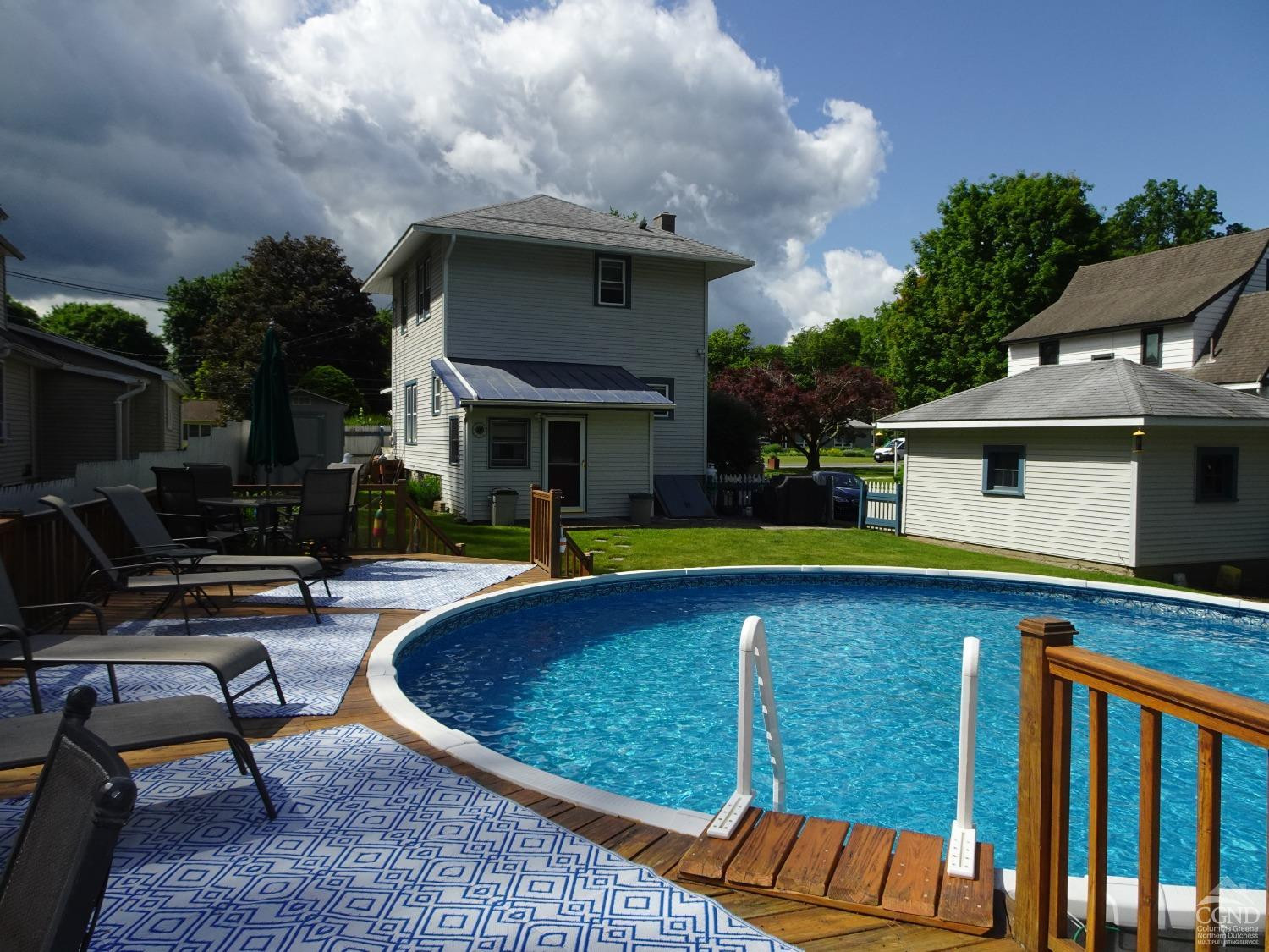 161 Highway 23 Claverack, NY 12513 - Photo 38 of 56 a view of a house with swimming pool and sitting area