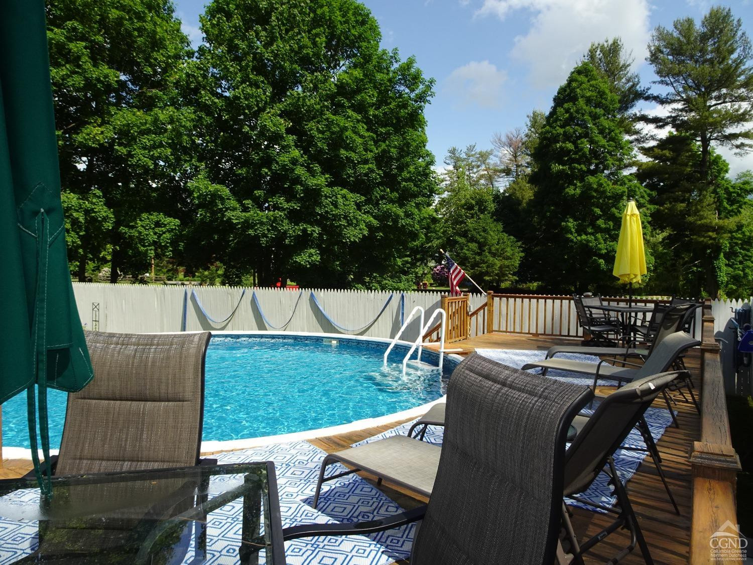 161 Highway 23 Claverack, NY 12513 - Photo 41 of 56 a view of deck with furniture and garden