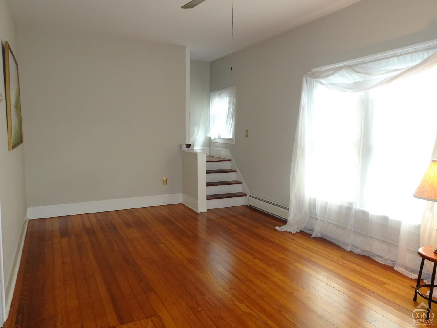 161 Highway 23 Claverack, NY 12513 - Photo 10 of 56 a view of a room with wooden floor and window