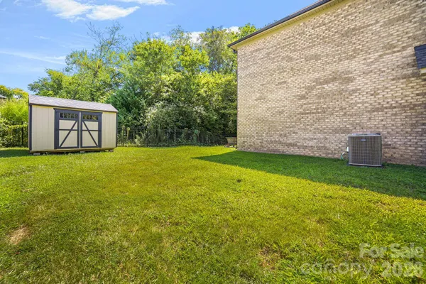 a view of a backyard with a garden