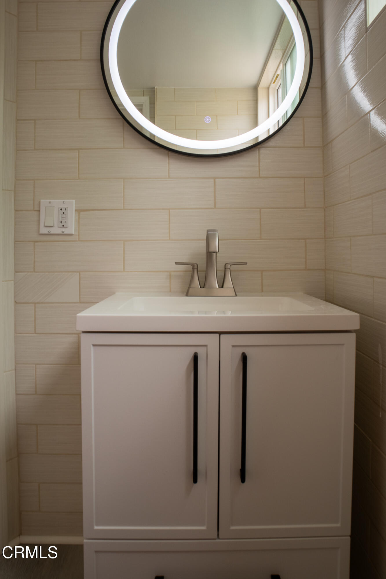 5246 Hub Street Los Angeles, CA 90042 - Photo 7 of 12 a bathroom with a sink and a mirror