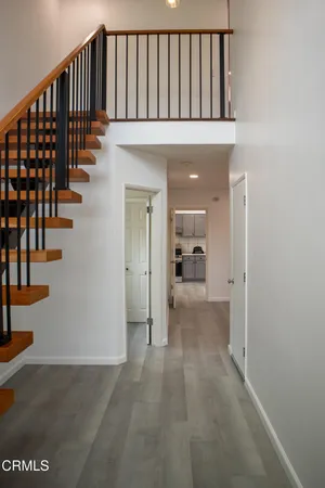 a view of entryway with wooden floor