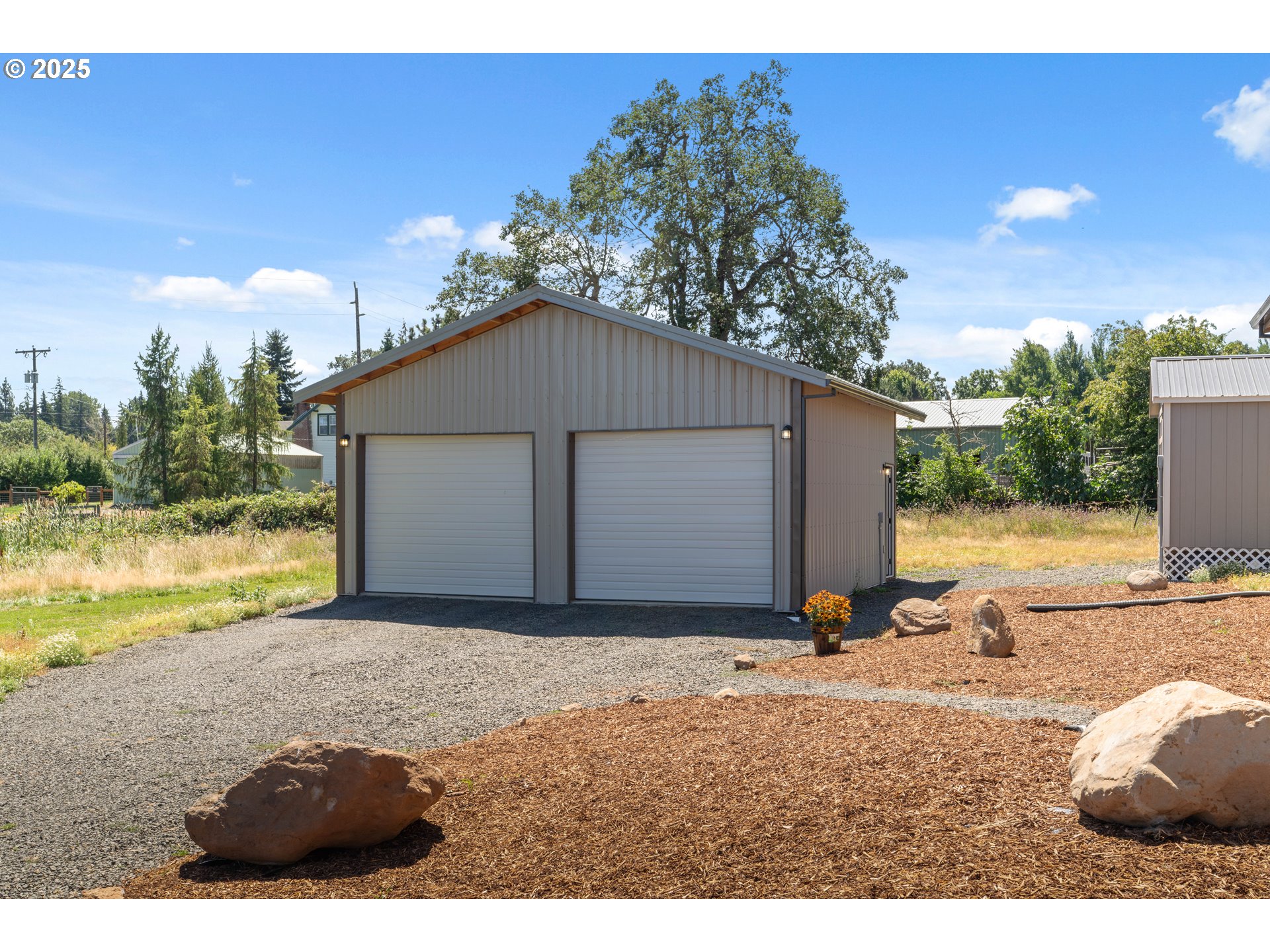 1682 Markham Road Hood River, OR 97031 - Photo 11 of 22 a view of a house with backyard and garden