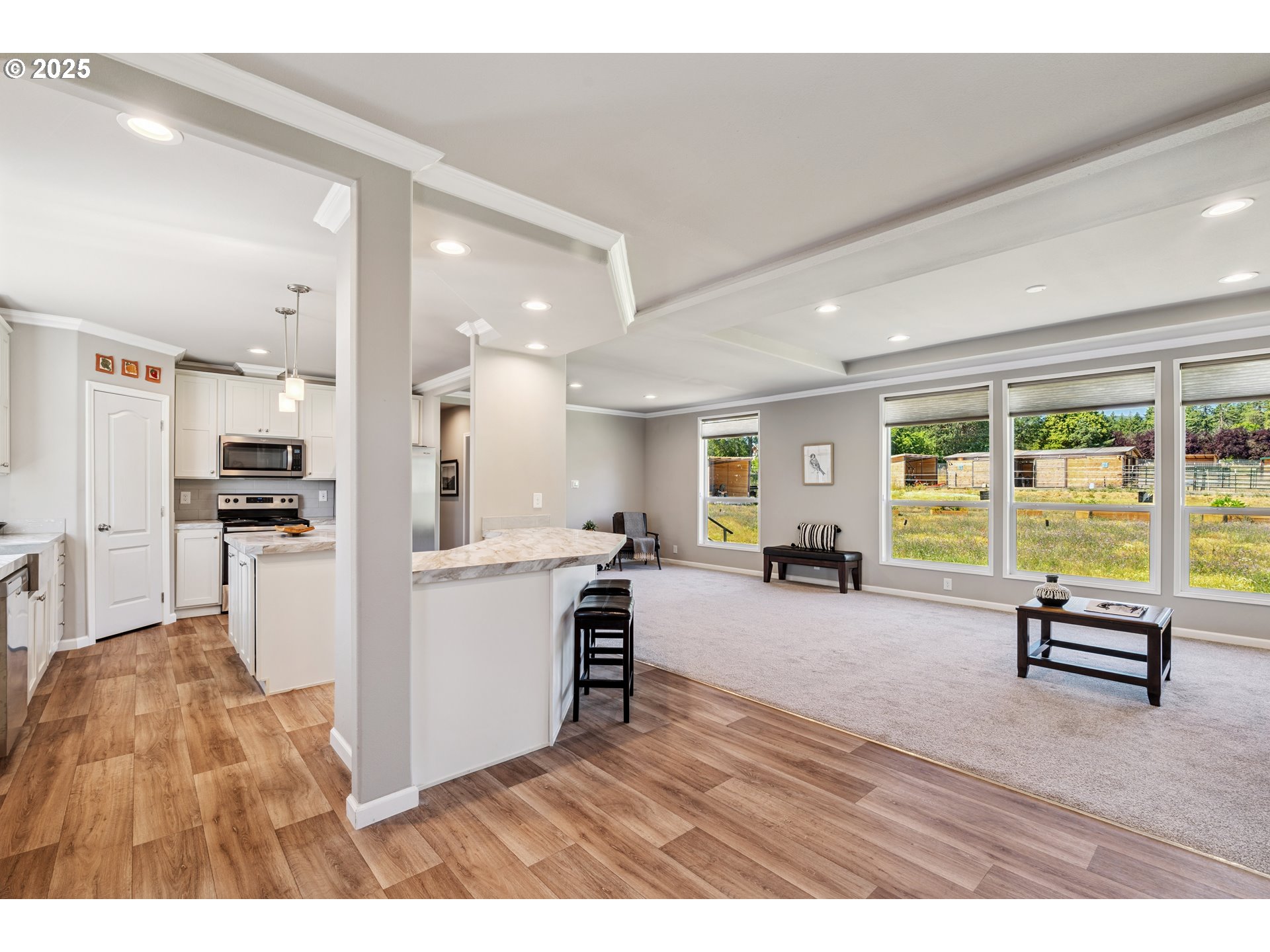 1682 Markham Road Hood River, OR 97031 - Photo 12 of 22 a living room with furniture and large windows