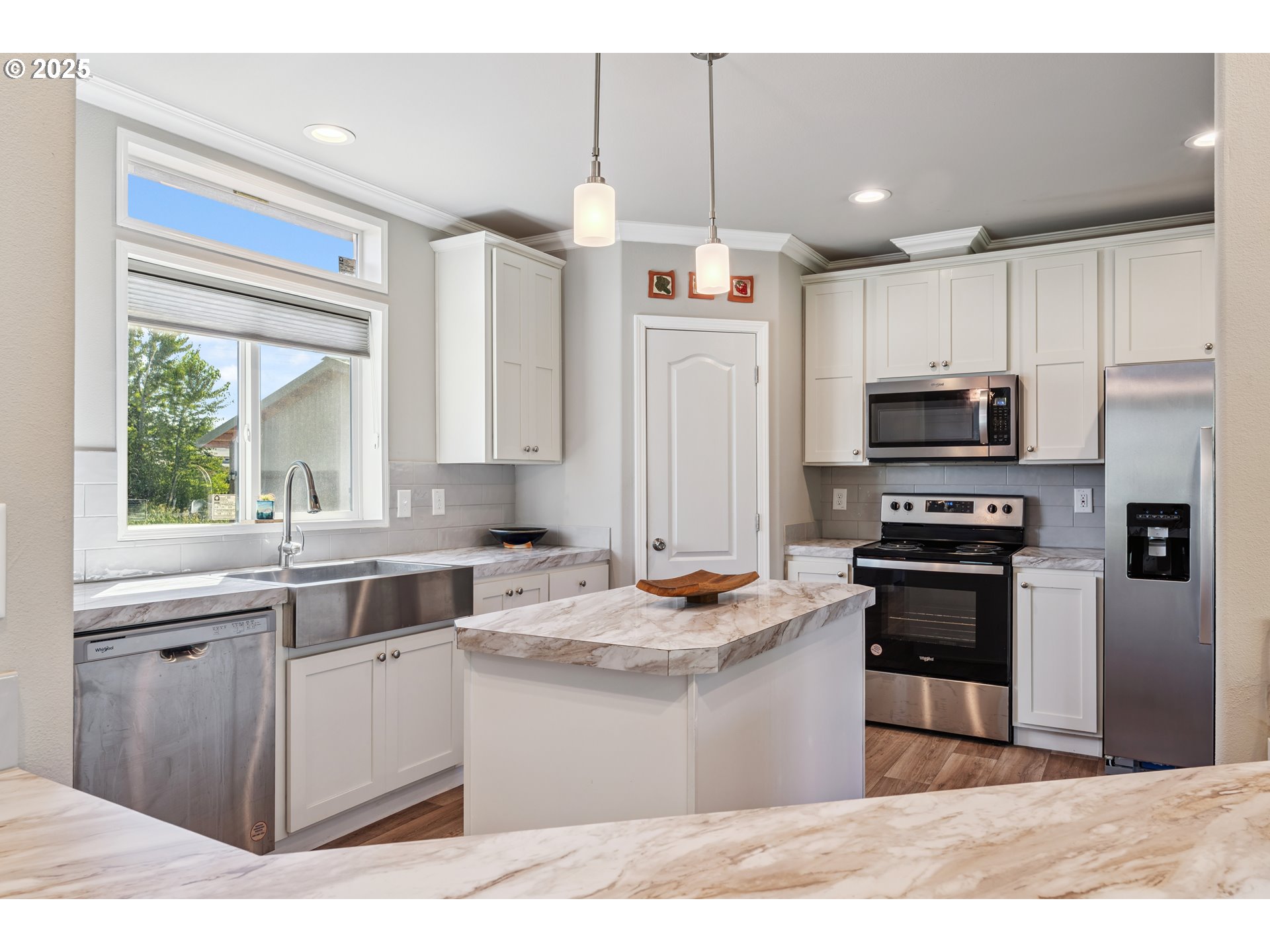 1682 Markham Road Hood River, OR 97031 - Photo 15 of 22 a kitchen with a sink stove and microwave