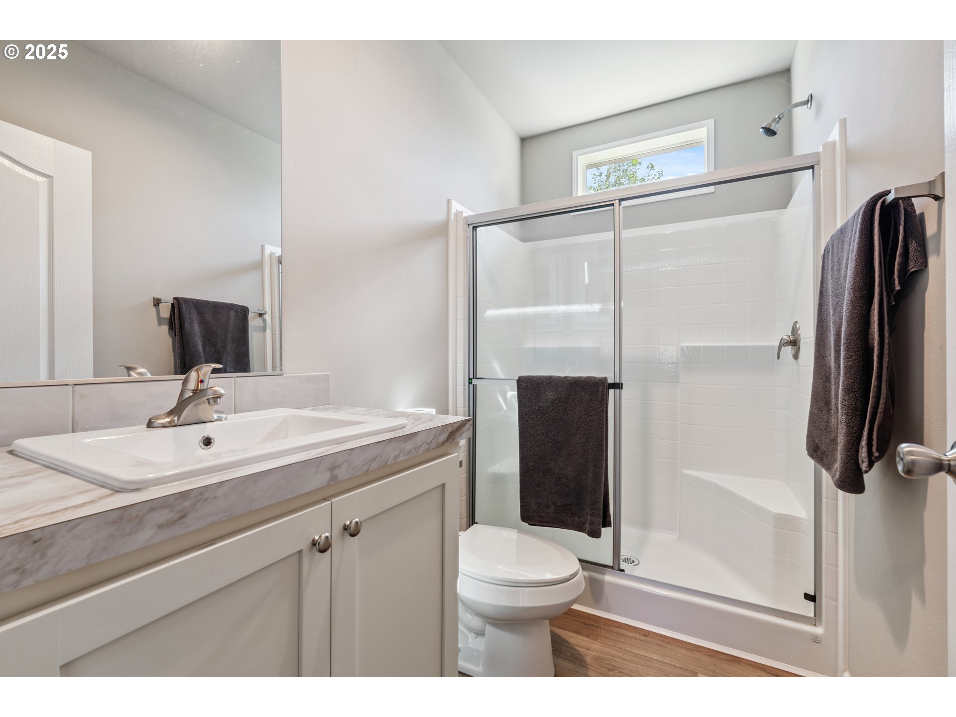 1682 Markham Road Hood River, OR 97031 - Photo 21 of 22 a bathroom with a sink a toilet and shower